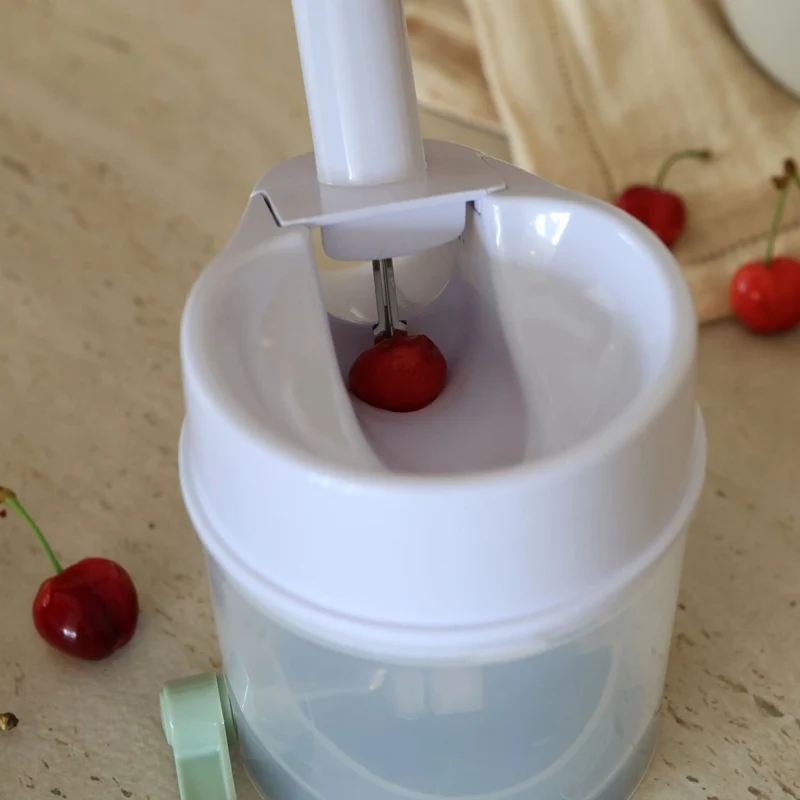 Dénoyauteur à cerises en plastique blanc