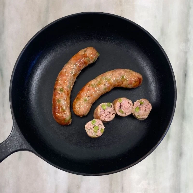 3 Saucisses au risotto de pois verts et parmesan (porc)