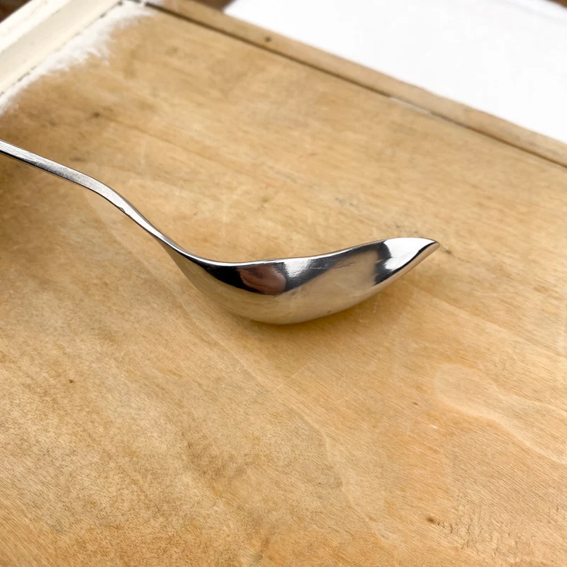 Cuillère plume en inox