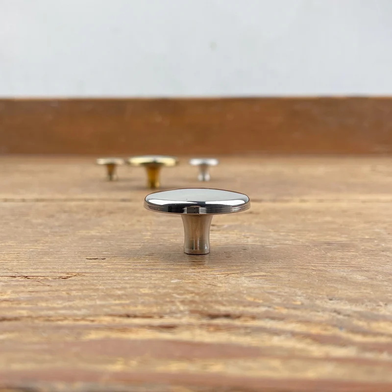 Bouton de cocotte rond en laiton