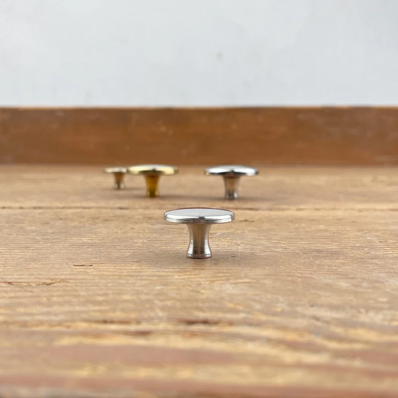 Bouton de cocotte rond en laiton