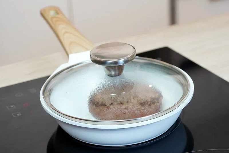 Couvercle en verre bombé Cookut à bouton en inox